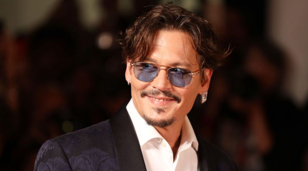 
	Johnny Depp, apariție excentrică la Festivalul de Film de la Veneția
